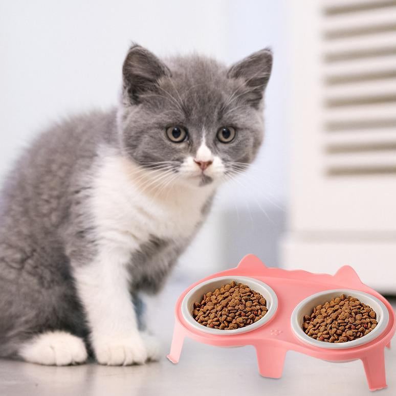 Cat eating from KittyVerse ball-shaped slow feeder bowl